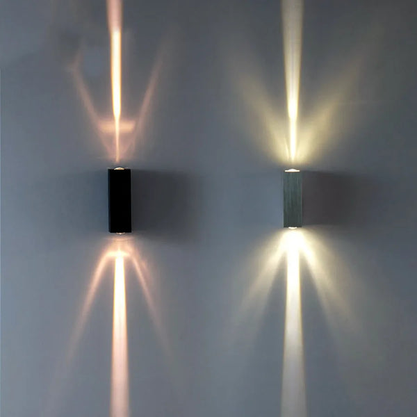 Applique murale LED d’extérieur de 6W avec éclairage haut et bas. Design rectangulaire en aluminium, étanche IP65, idéale pour terrasse et façade.