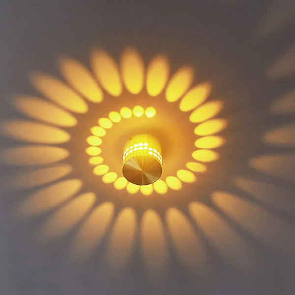 Plafonnier LED moderne avec effet lumineux en spirale projeté au plafond. Design cylindrique compact et ambiance décorative spectaculaire.